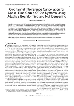 Co-channel Interference Cancellation for Space-Time Coded OFDM Systems
  Using Adaptive Beamforming and Null Deepening