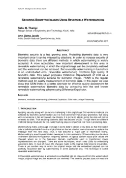 Securing Biometric Images using Reversible Watermarking